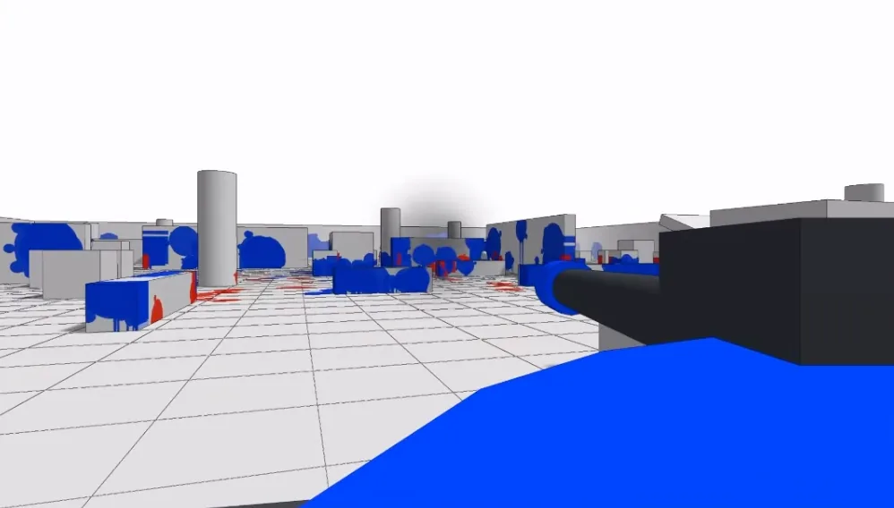 White grid arena with crates and cylinders splattered in blue and red paint, viewed down the barrel of a dark paintball gun